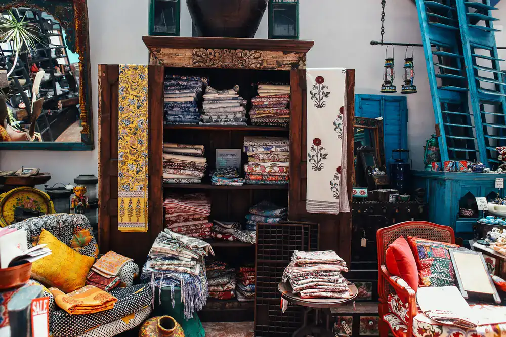 Curated interior of the antiques shop featuring vintage furniture and decorative pieces